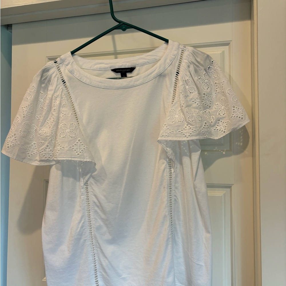 White blouse with eyelet sleeves